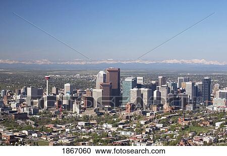 calgary, alberta, canada; calgary skyline with mountains in the background View Large Photo Image Stock Image - calgary, alberta, canada; calgary skyline with mountains in the background. Fotosearch