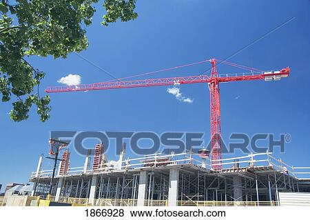 calgary, alberta, canada; construction crane and building frame View Large Photo Image Stock Photo - calgary, alberta, canada; construction crane and building frame. Fotosearch