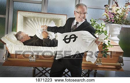 Stock Image - death of a family member leaves an inheritance. Fotosearch
