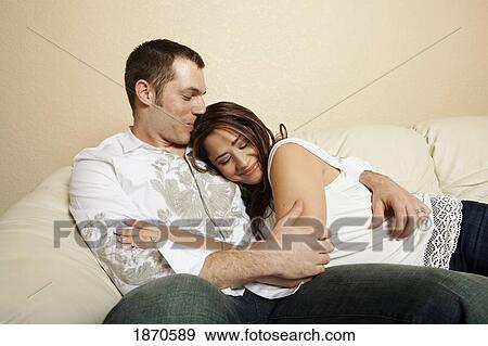 Stock Photo - fort lauderdale, florida, united states of america; a couple holding each other close. Fotosearch