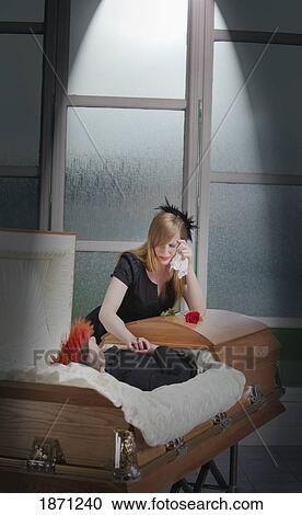 grieving the death of a loved one View Large Photo Image Stock Image - grieving the death of a loved one. Fotosearch