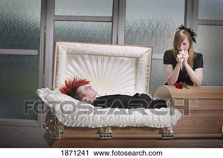 Stock Image - grieving the death of a loved one. Fotosearch