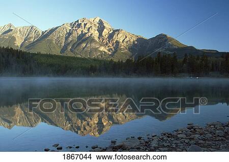 Picture - jasper national park, alberta, canada; pyramid lake and mountains. Fotosearch