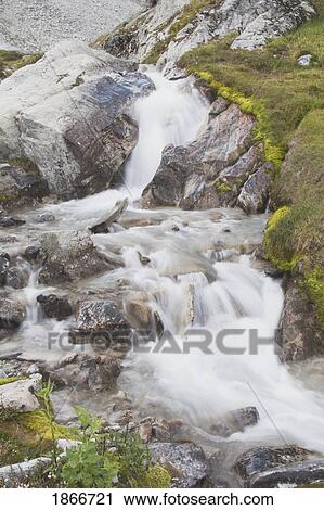 Stock Image - kananaskis country, alberta, canada; a stream flowing over the rocks. Fotosearch