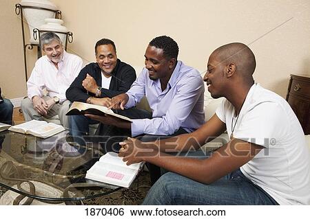 men in a home bible study View Large Photo Image Stock Photograph - men in a home bible study. Fotosearch