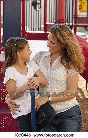 mother and daughter at the playground View Large Photo Image Stock Photography - mother and daughter at the playground. Fotosearch