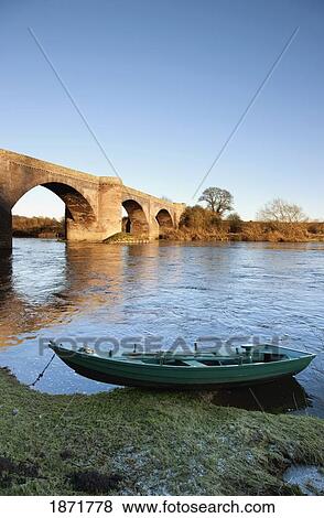 northumberland, england; a boat moored along the shore View Large Photo Image Stock Photo - northumberland, england; a boat moored along the shore. Fotosearch