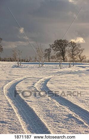 northumberland, england; tire tracks in the snow View Large Photo Image Stock Photo - northumberland, england; tire tracks in the snow. Fotosearch