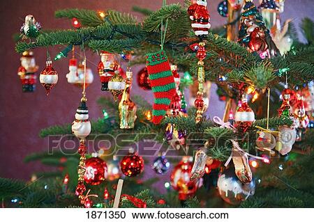 Stock Image - ornaments on a christmas tree. Fotosearch