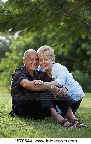 Picture - portrait of a couple in the park. Fotosearch