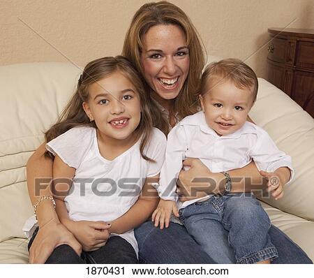 portrait of a mother with her two children View Large Photo Image Stock Image - portrait of a mother with her two children. Fotosearch
