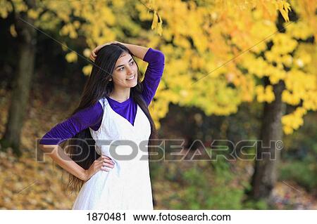 Stock Image - portrait of a teenage girl in autumn. Fotosearch