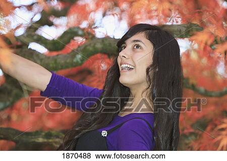 portrait of a teenage girl in autumn View Large Photo Image Stock Photo - portrait of a teenage girl in autumn. Fotosearch