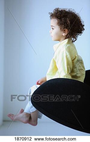 portrait of a young boy View Large Photo Image Stock Image - portrait of a young boy. Fotosearch
