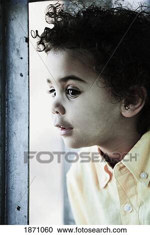 portrait of a young boy View Large Photo Image Stock Image - portrait of a young boy. Fotosearch