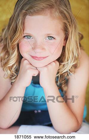 portrait of a young girl View Large Photo Image Stock Photography - portrait of a young girl. Fotosearch
