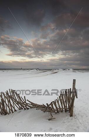 south shields, tyne and wear, england; a broken fence in a snow-covered field View Large Photo Image Stock Photo - south shields, tyne and wear, england; a broken fence in a snow-covered field. Fotosearch