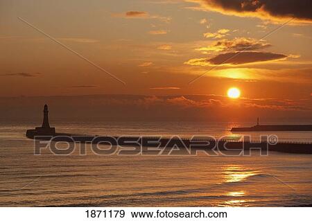 Stock Photo - sunderland, tyne and wear, england; a lighthouse at the end of a pier. Fotosearch