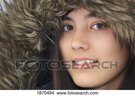 teenage girl wearing a fur trimmed hood View Large Photo Image Picture - teenage girl wearing a fur trimmed hood. Fotosearch