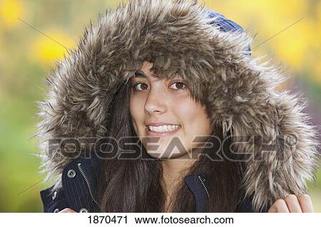 teenage girl wearing a fur trimmed hood View Large Photo Image Stock Image - teenage girl wearing a fur trimmed hood. Fotosearch