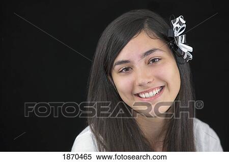 teenage girl with a flower in her hair View Large Photo Image Stock Photography - teenage girl with a flower in her hair. Fotosearch