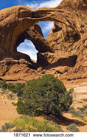 Stock Image - utah, united states of america; double arch formation at arches national park. Fotosearch