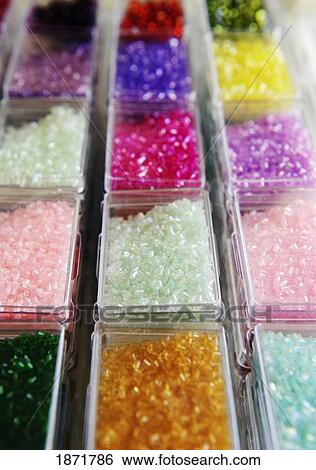 variety of beads sorted by color in containers View Large Photo Image Stock Photograph - variety of beads sorted by color in containers. Fotosearch