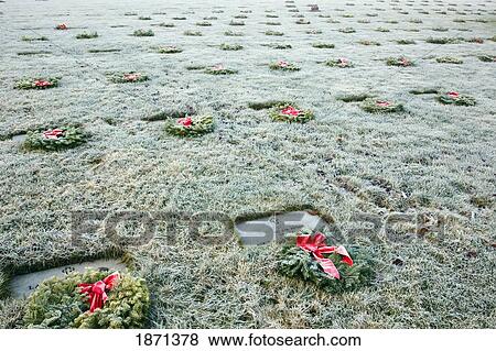 wreaths laid in front of grave markers with frost on the grass View Large Photo Image Stock Photo - wreaths laid in front of grave markers with frost on the grass. Fotosearch