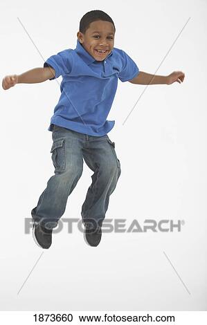 Stock Image - a boy jumping. Fotosearch