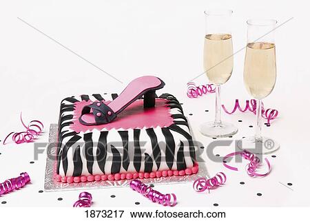 a celebratory cake with a heeled shoe to decorate it View Large Photo Image Stock Photo - a celebratory cake with a heeled shoe to decorate it. Fotosearch