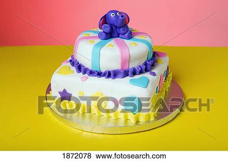 a children's birthday cake with a blue elephant on top View Large Photo Image Stock Photo - a children's birthday cake with a blue elephant on top. Fotosearch