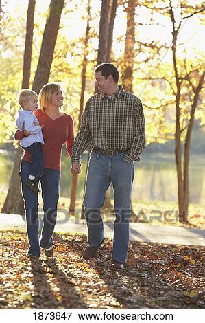 a family walk in autumn View Large Photo Image Stock Photo - a family walk in autumn. Fotosearch