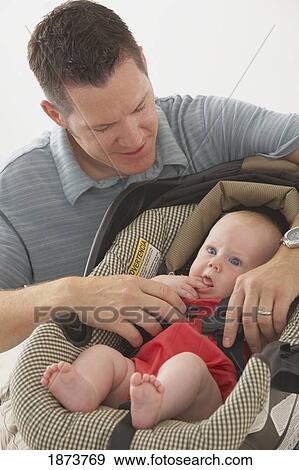 Stock Photo - a father with his infant son. Fotosearch