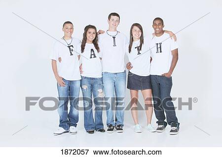 a group of teenagers wearing t-shirts with the message 'faith' View Large Photo Image Stock Photo - a group of teenagers wearing t-shirts with the message 'faith'. Fotosearch