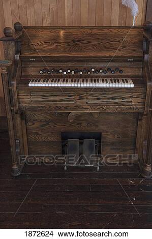 a piano with foot pedals View Large Photo Image Picture - a piano with foot pedals. Fotosearch