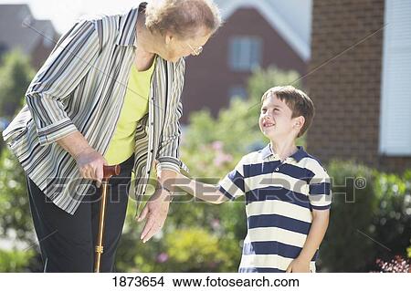 a senior woman and a boy View Large Photo Image Picture - a senior woman and a boy. Fotosearch