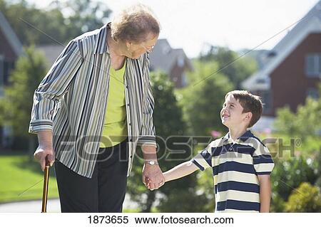 a senior woman and a boy View Large Photo Image Stock Photography - a senior woman and a boy. Fotosearch