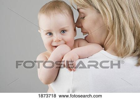 a toddler boy and his mother View Large Photo Image Stock Photo - a toddler boy and his mother. Fotosearch