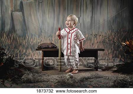 a toddler in a vintage baseball theme set View Large Photo Image Stock Image - a toddler in a vintage baseball theme set. Fotosearch