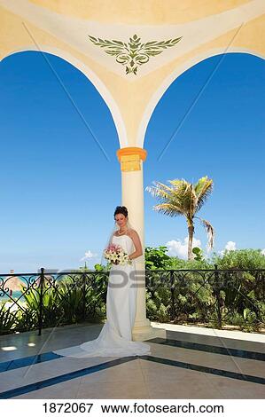 akumal, riviera maya, mexico; a bride in a gazebo by the beach at gran bahia principe tulum all-inclusive resort View Large Photo Image Stock Photo - akumal, riviera maya, mexico; a bride in a gazebo by the beach at gran bahia principe tulum all-inclusive resort. Fotosearch