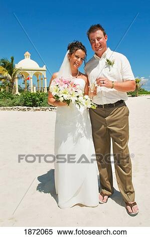 akumal, riviera maya, mexico; a bride and groom on the beach at gran bahia principe tulum all-inclusive resort View Large Photo Image Stock Photography - akumal, riviera maya, mexico; a bride and groom on the beach at gran bahia principe tulum all-inclusive resort. Fotosearch