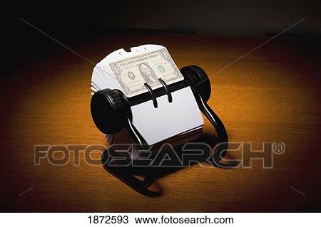 an american dollar bill in a rolodex View Large Photo Image Stock Image - an american dollar bill in a rolodex. Fotosearch