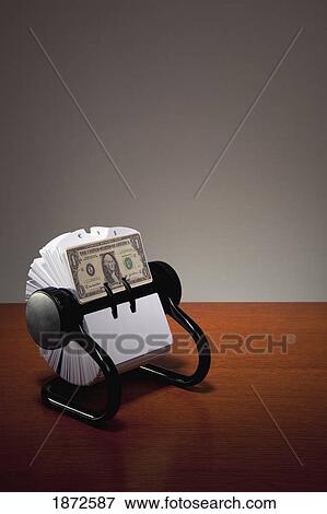 an american dollar bill in a rolodex View Large Photo Image Stock Photo - an american dollar bill in a rolodex. Fotosearch