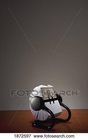 an american dollar bill in a rolodex View Large Photo Image Stock Photo - an american dollar bill in a rolodex. Fotosearch