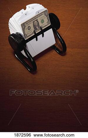 an american dollar bill in a rolodex View Large Photo Image Stock Photograph - an american dollar bill in a rolodex. Fotosearch
