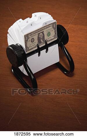 an american dollar bill in a rolodex View Large Photo Image Stock Photography - an american dollar bill in a rolodex. Fotosearch