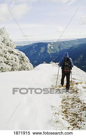 Stock Photography - columbia river gorge, washington, united states of america; a hiker on dog mountain. Fotosearch