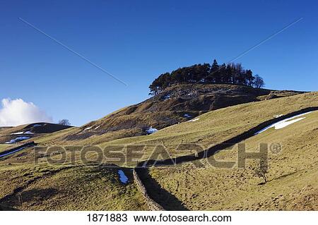 Stock Image - durham dales, county durham, england; hills with traces of snow. Fotosearch