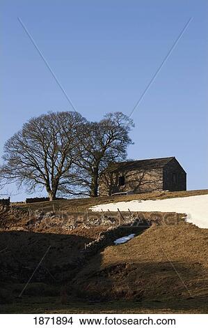 durham dales, durham county, england; a building against a blue sky with traces of snow View Large Photo Image Picture - durham dales, durham county, england; a building against a blue sky with traces of snow. Fotosearch
