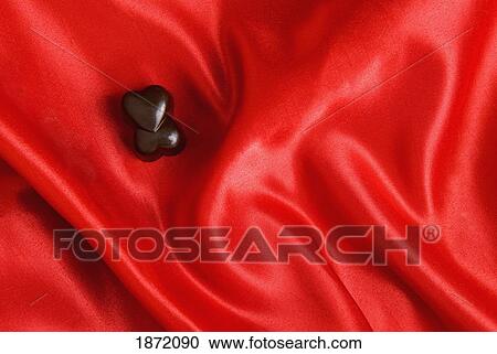 Stock Image - heart shaped chocolates. Fotosearch